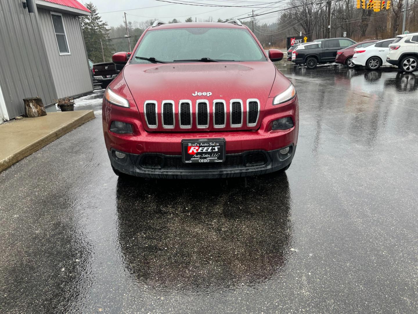 2014 Red /Black Jeep Cherokee Latitude 4WD (1C4PJMCB7EW) with an 2.4L I4 DOHC 16V engine, 9-Speed Automatic transmission, located at 11115 Chardon Rd. , Chardon, OH, 44024, (440) 214-9705, 41.580246, -81.241943 - Photo#1